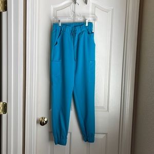 JAANUU XS Mesh Enhanced Jogger Pants - Teal